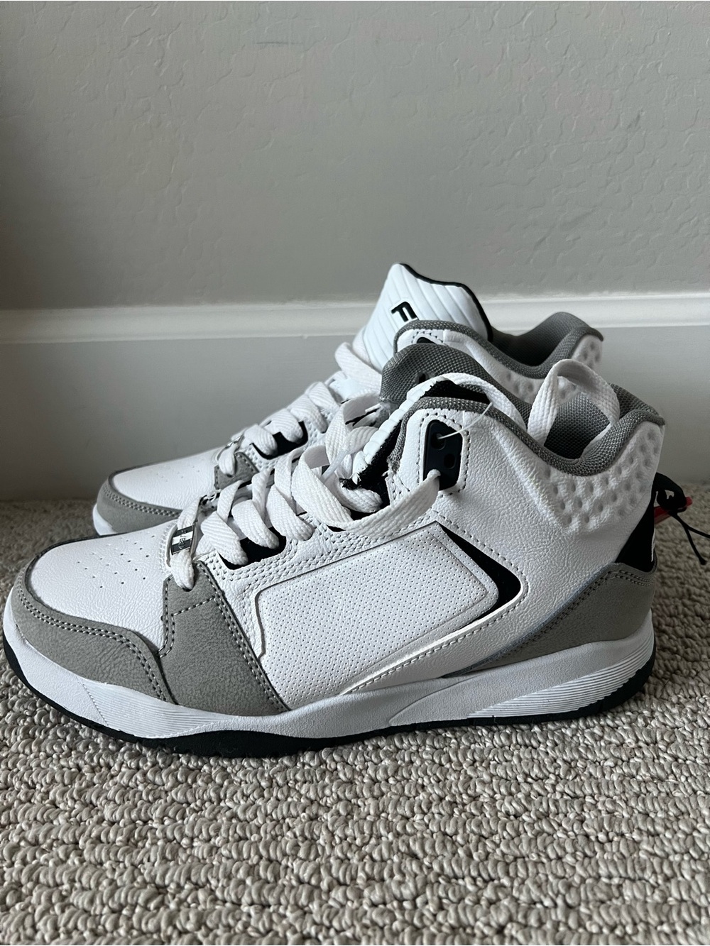 pair of 

FUBU Men's the Hustle Athletic Leisure Sneakers size 7 NWT $25